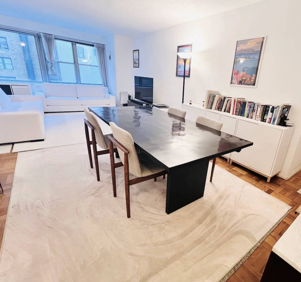 Steps to Central Park, 6B at Mayfair Towers is an oversized Junior 4 apartment featuring a formal dining area, and an expansive living room, large enough for a home office.