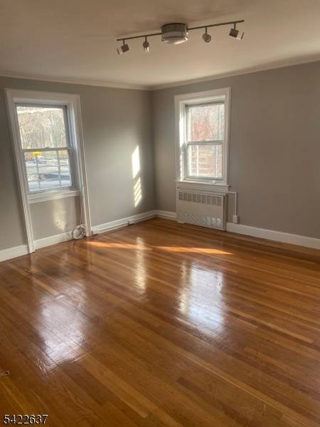 This Beautiful Stately Solid Brick Mansion Home is located at corner of Elizabeth Avenue and Vasar.