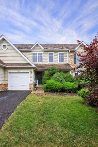 Bright Luxurious Patriot Hill Townhouse has FOUR finished levels of living space, including a Finished WALK OUT Basement w built ins an office area.