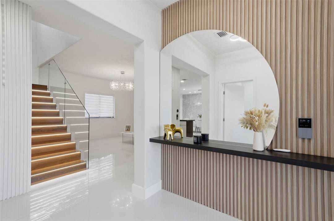 Magnificently updated and fully renovated single family home with 3 bedrooms plus a flexible den, 3 full bathrooms, pool and complemented by stylish porcelain flooring throughout and a modern, renovated ...