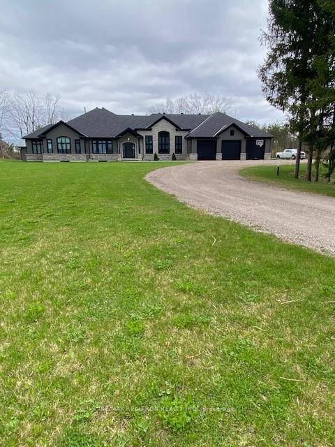 Experience unparalleled privacy and luxury in this stunning custom built bungalow, nestled on 10 beautifully treed acres and accessed through secure electronic gates.