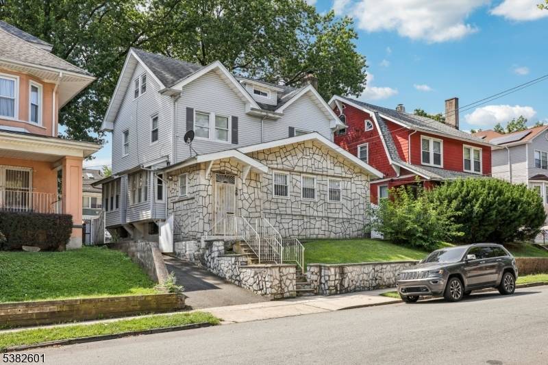 WELCOME HOME ! Step into this large, charming, and well maintained Colonial nestled in the desirable Weequahic section of Newark.