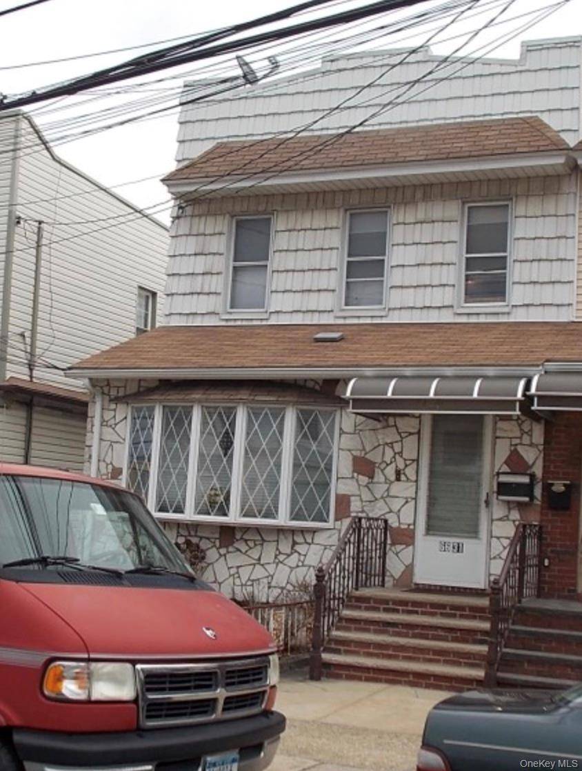Located just two blocks from Juniper Valley Park and Metropolitan Avenue, this lovely two family semi detached home offers both convenience and potential.
