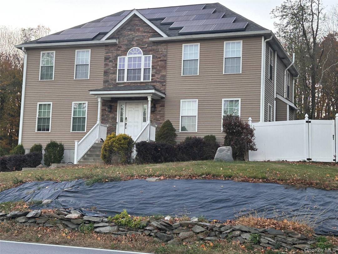 Beautiful 4 bedroom, 2. 5 bath home with two story foyer, hardwood floors, and sun filled living spaces.