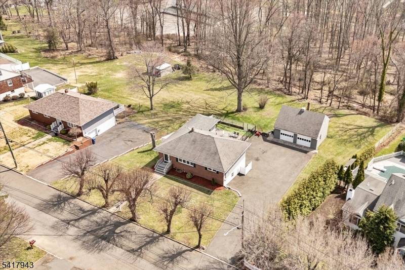 A rare find in Totowa ! This custom brick front ranch with in law suite potential is nestled on a quiet street that backs up to the PAL.