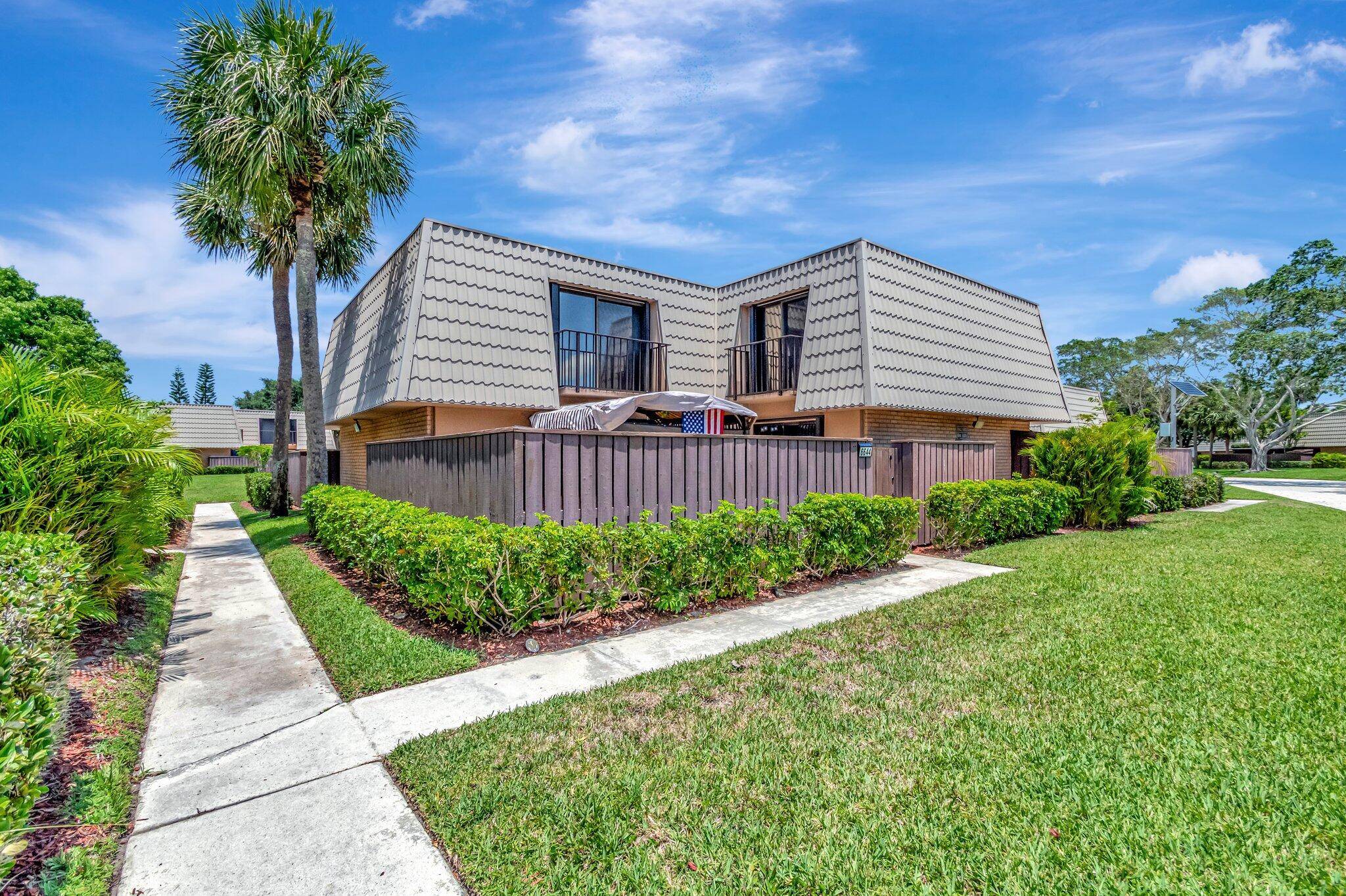 Tucked away in Sandalwood Lakes South, this charming 2BR 2.