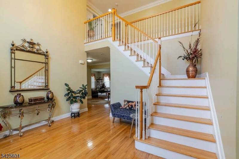 Welcome home to this beautiful center hall colonial that is nestled in a quiet cul de sac of Lincoln Estates in the prestigious East Hanover.