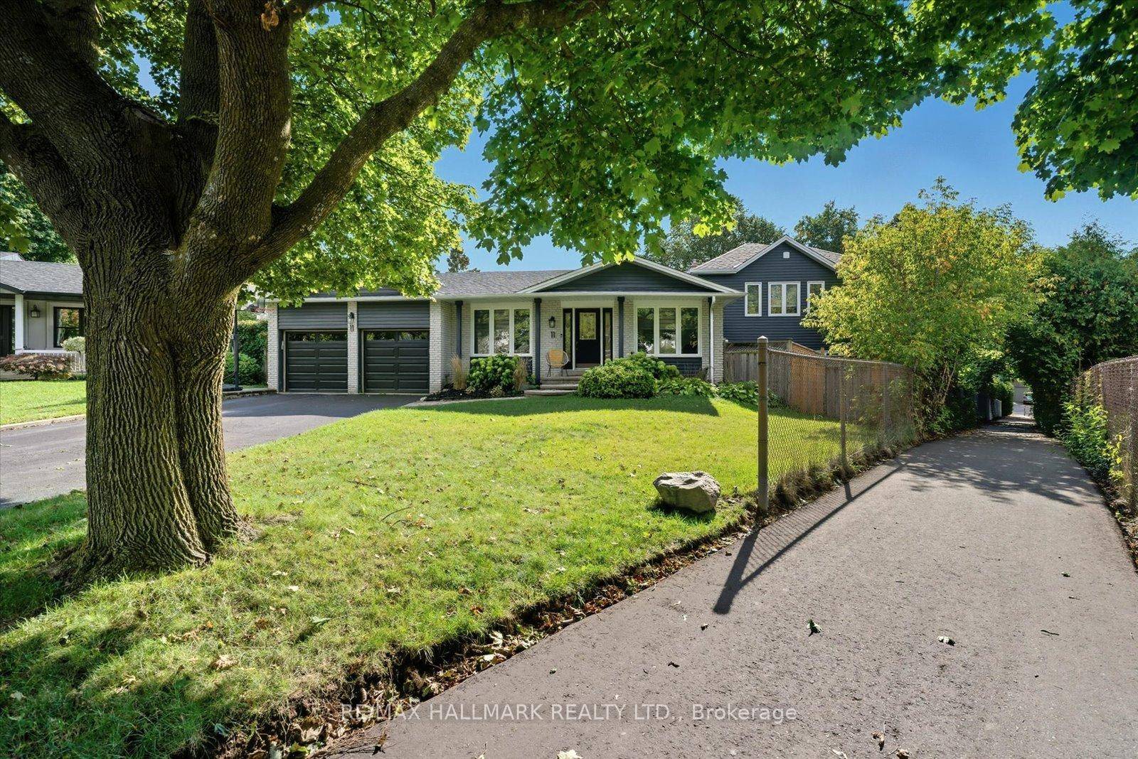 Welcome home ! This completely reconstructed masterpiece sits on a private, oversized lot with sun filled southwest exposure.