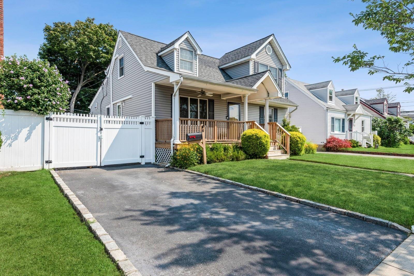 Welcome to this beautifully maintained 4 bedroom, 2 bath home located in the heart of Hicksville !