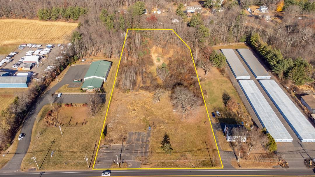 Looking for a level building lot in a thriving commercial and residential area ?