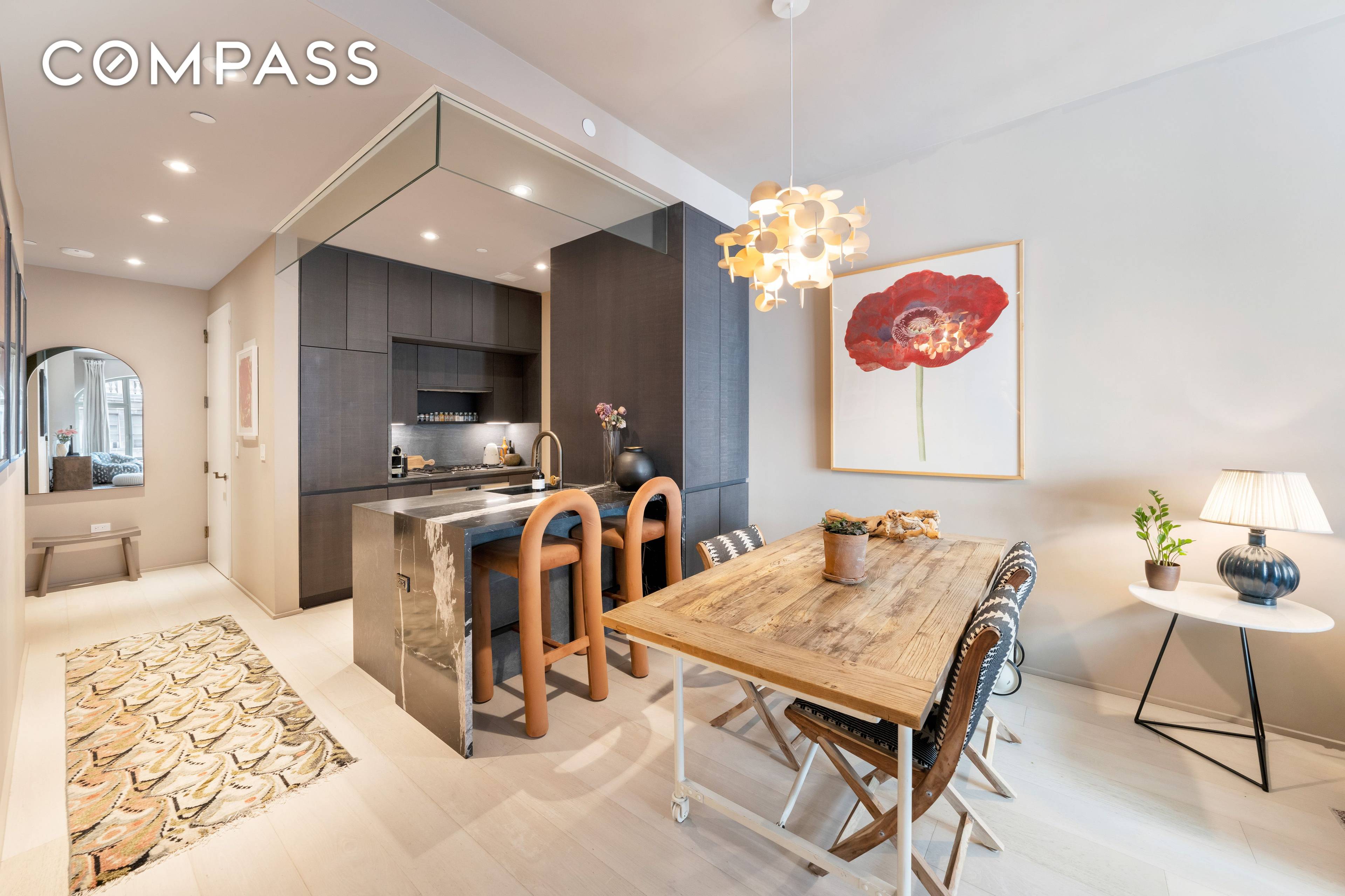 Step into refined elegance in Residence 21A, a one bedroom, one bath home distinguished by 10 foot ceilings, oversized arched bronze detailed windows, and breathtaking sunrise views over the Brooklyn ...