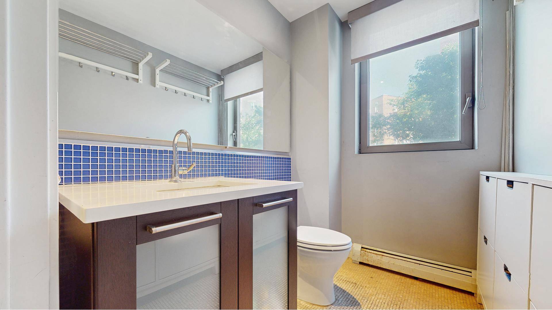 VIRTUAL TOURS AVAILABLE TOWNHOUSE STYLE CONDO DEEDED PARKING SPACE Located in Forest Hills, this expansive 2 bedroom, 2.