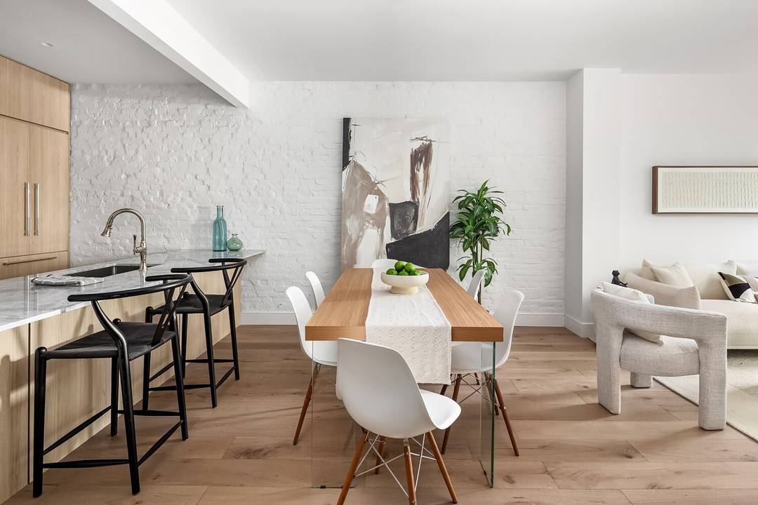 CC 595. 75 Tax 592. 61 A contemporary yet classic new gem is available in a brick facade townhouse on a serene, tree lined block with private back yard !