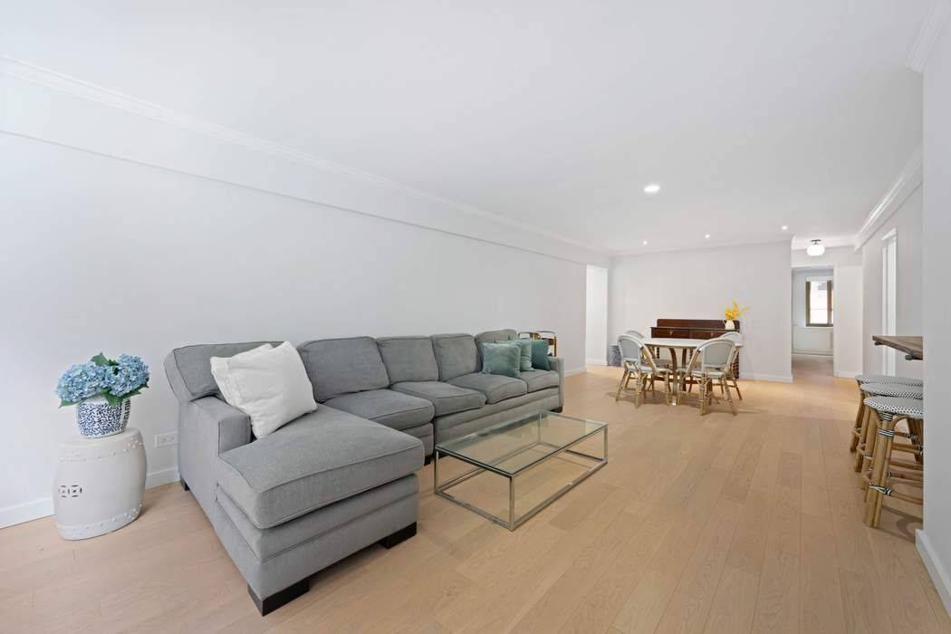 EXPANSIVE 2 BEDROOM FLOOR THROUGH HOME WITH 29 FOOT SOUTH FACING LIVING ROOM INVESTOR FRIENDLY CONDOP CONDO RULES Expertly appointed Open Layout features LARGE South facing living and bedroom Garden ...