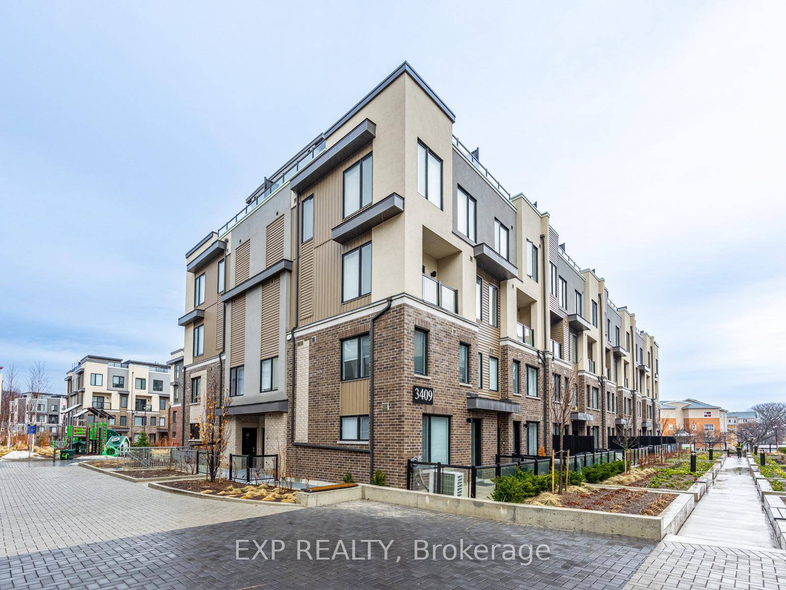 Modern Corner Unit Townhome with Rooftop Terrace 3409 Ridgeway Drive, Unit 18 Step into stylish, upgraded living in this stunning 1, 349 sq.