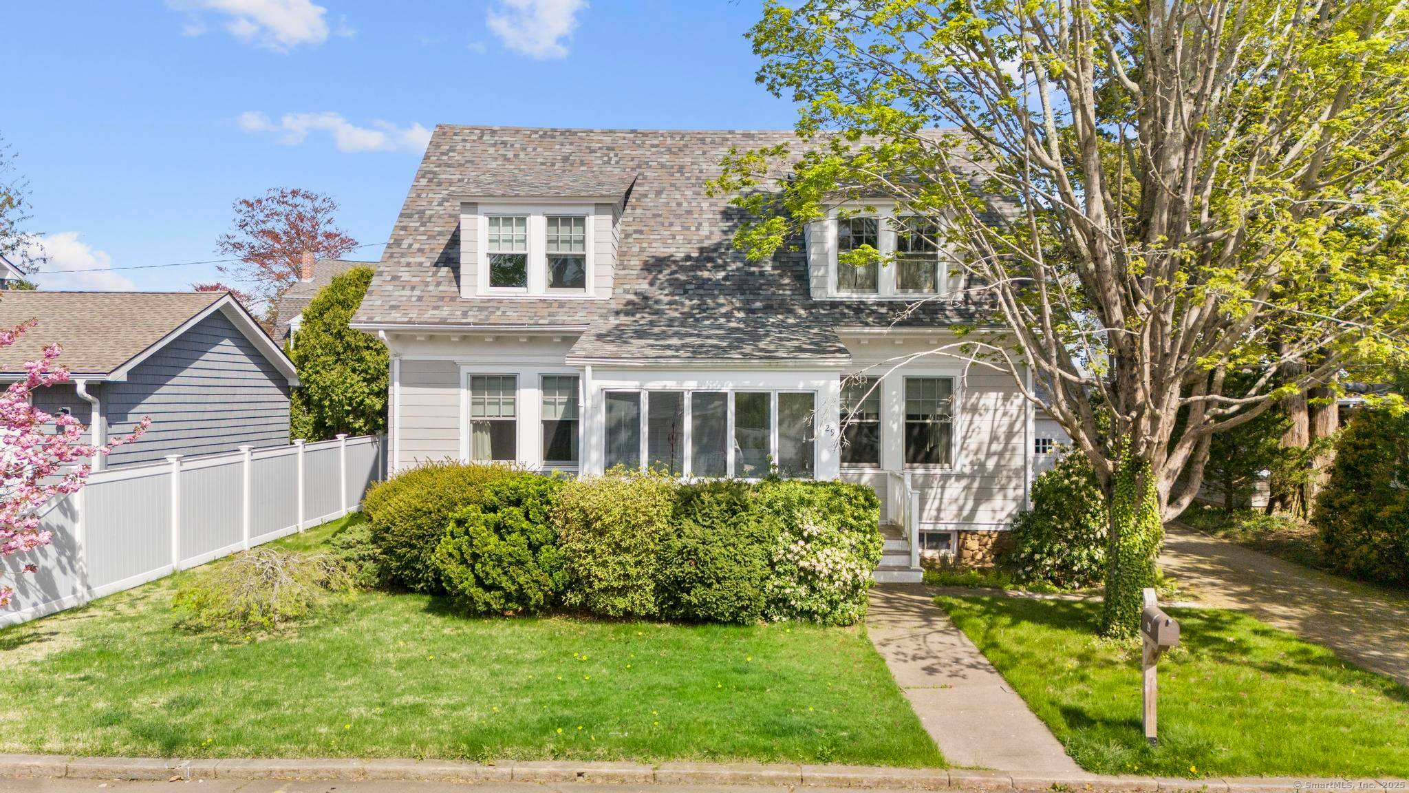 Nestled in the highly sought after Pine Orchard neighborhood, 29 Crescent Bluff beautifully merges early 20th century charm with modern conveniences with 2, 432 sq.