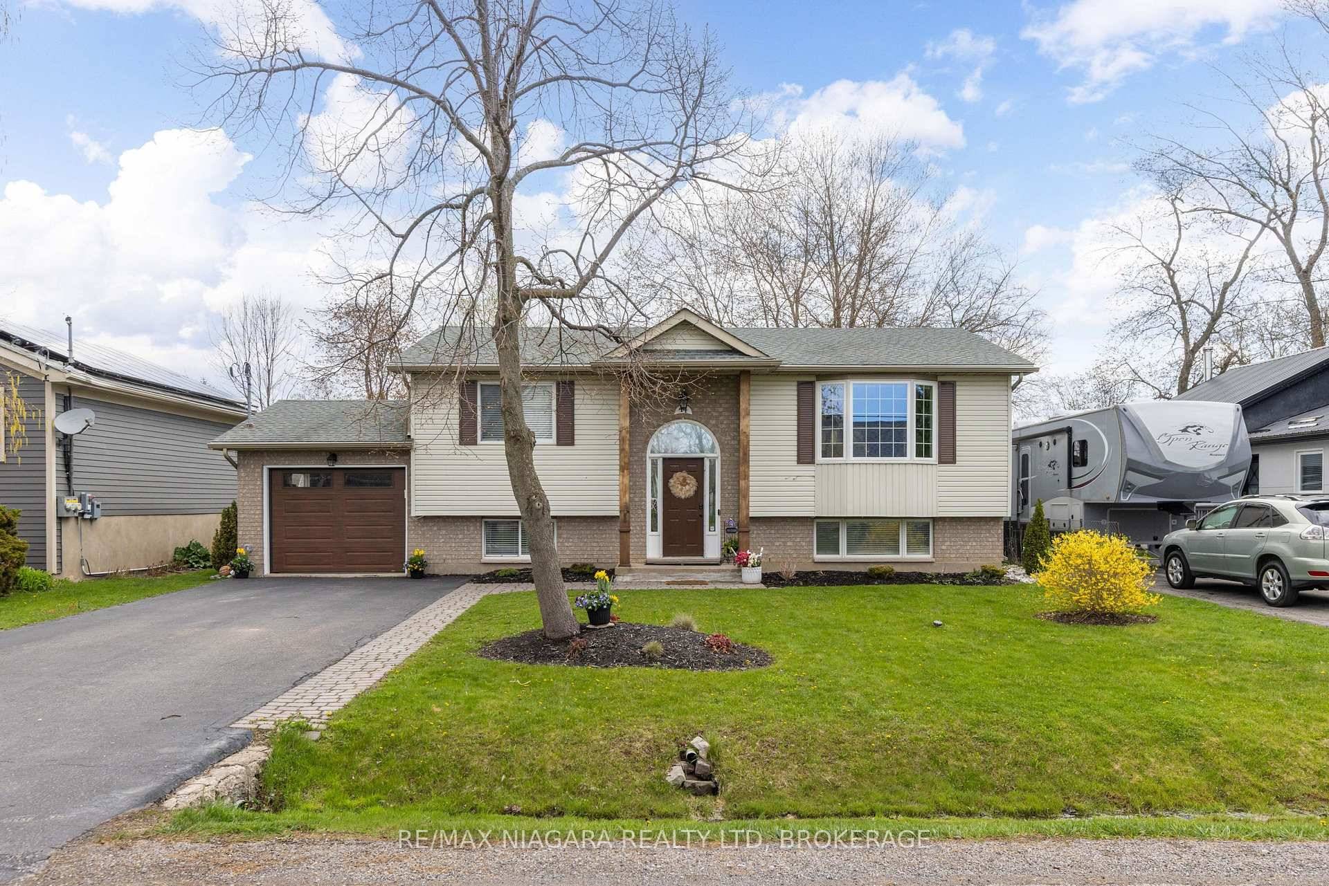 Enjoy the best of coastal living in this beautifully updated 2 2 bedroom, 2 bath raised bungalow, just a short stroll from the beach in sought after Ridgeway.