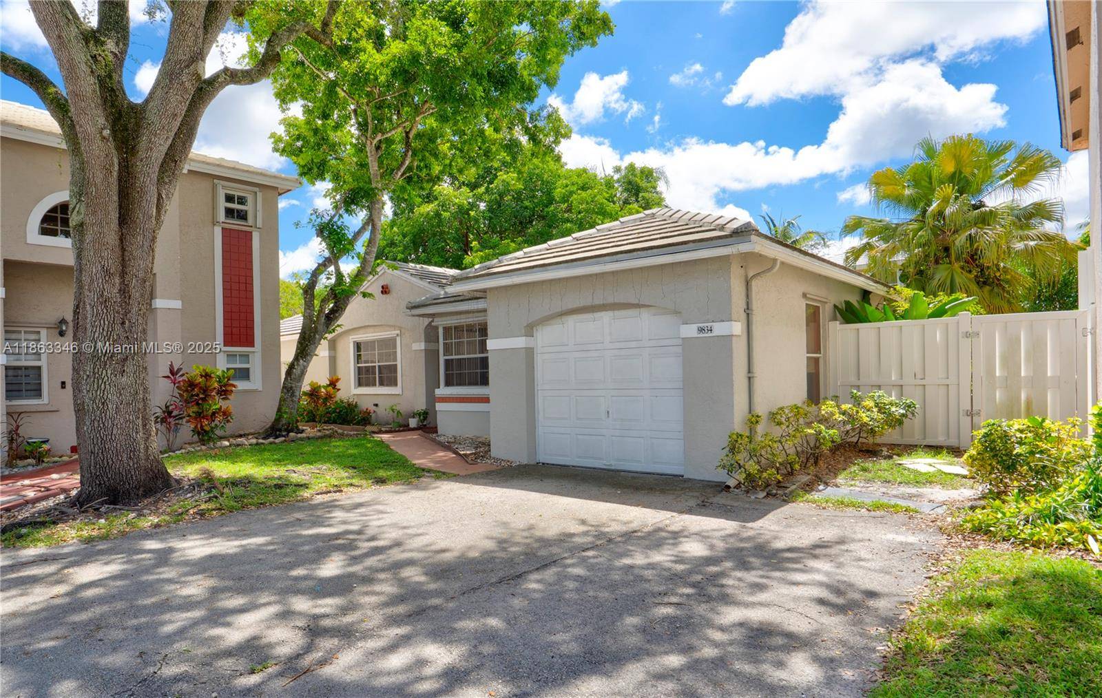 Plantation Jacaranda. Single family home with 3 bedrooms and a 1 car garage currently converted but easy to restore, or use as a 4th bedroom or home office.