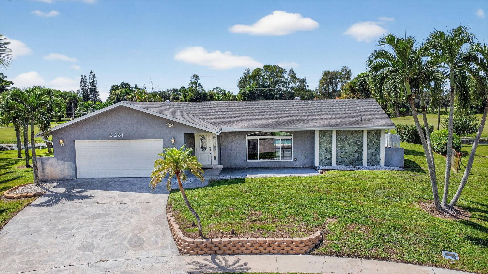 MAJOR PRICE ADJUSTMENT This stunning 3 bedroom, 2 bathroom home is nestled in one of the area's most sought after neighborhoods in West Lake Worth Wellington Area with no HOA ...