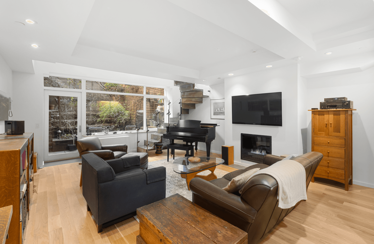 Nestled within a boutique four unit condominium, this exceptional triplex presents a secluded sanctuary with over 3, 000 square feet of indoor and outdoor living space.