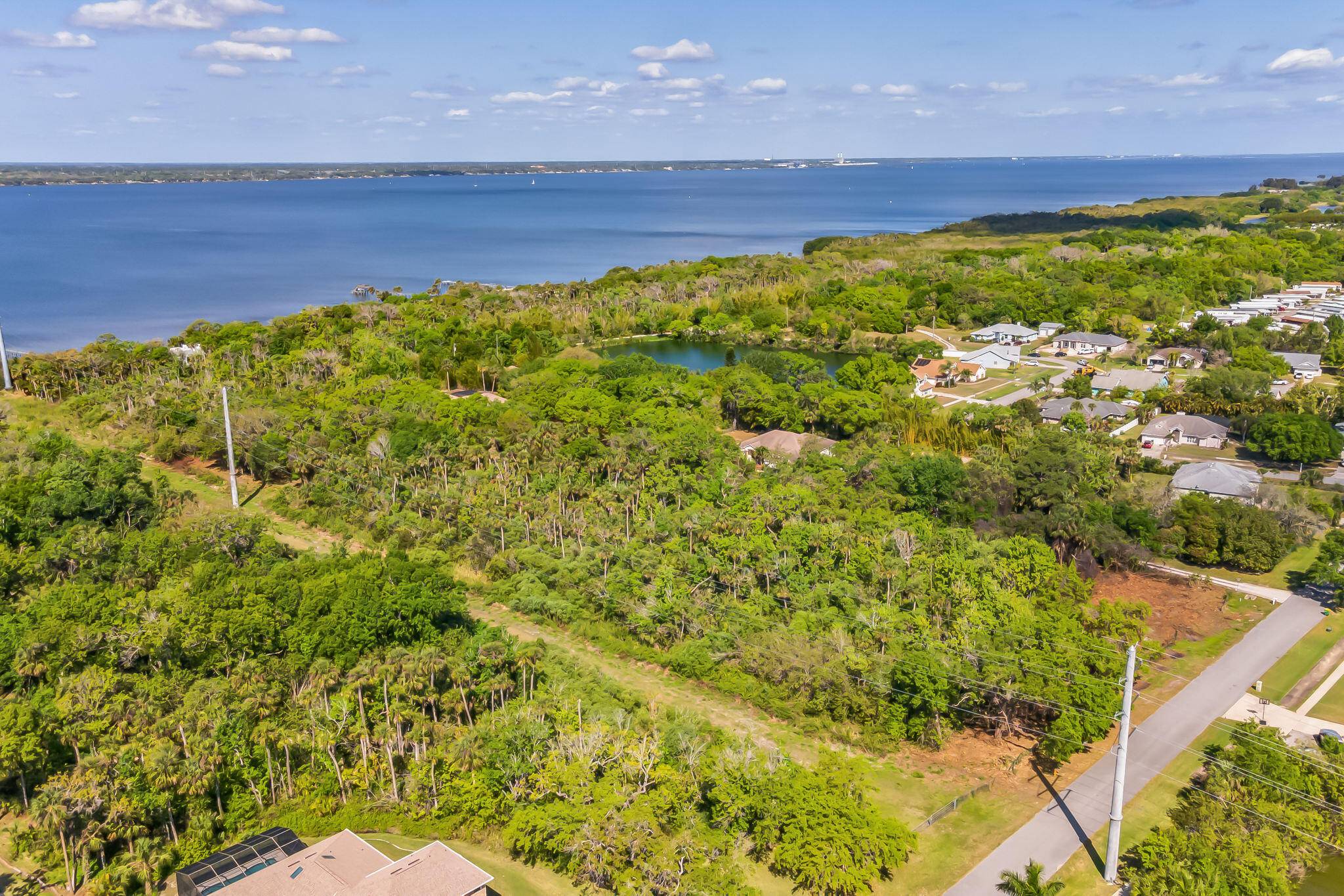 Riverfront Paradise Build Your Dream Estate on 6 Acres !