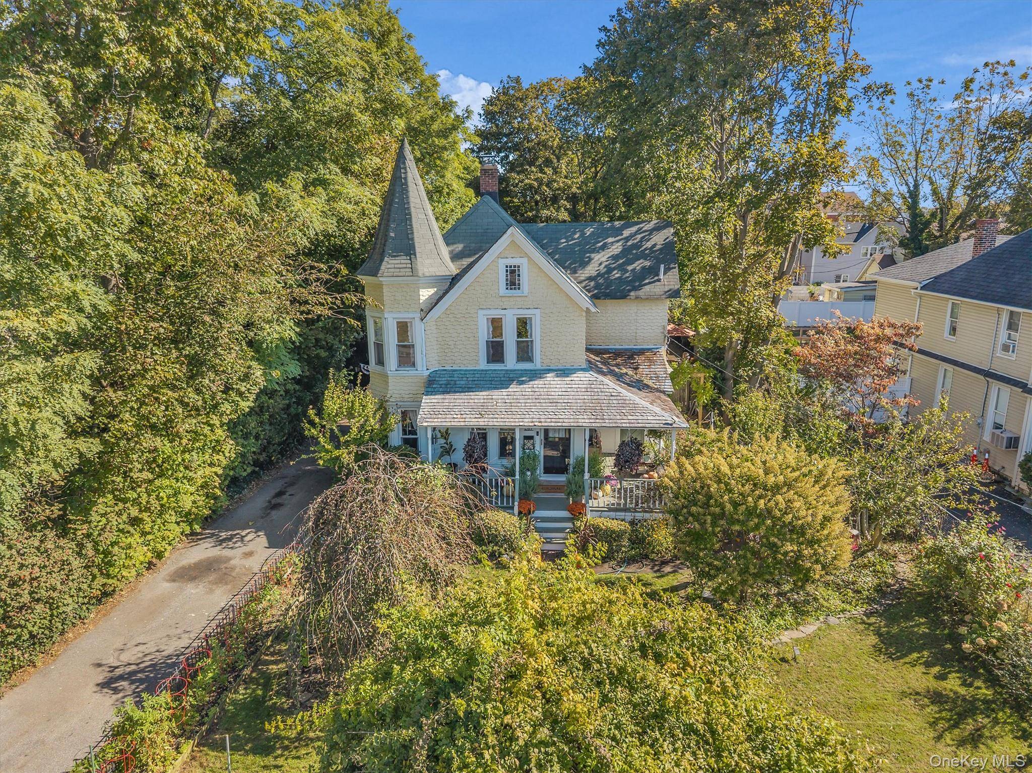 Welcome to this charming Victorian home located in the heart of Patchogue Village.