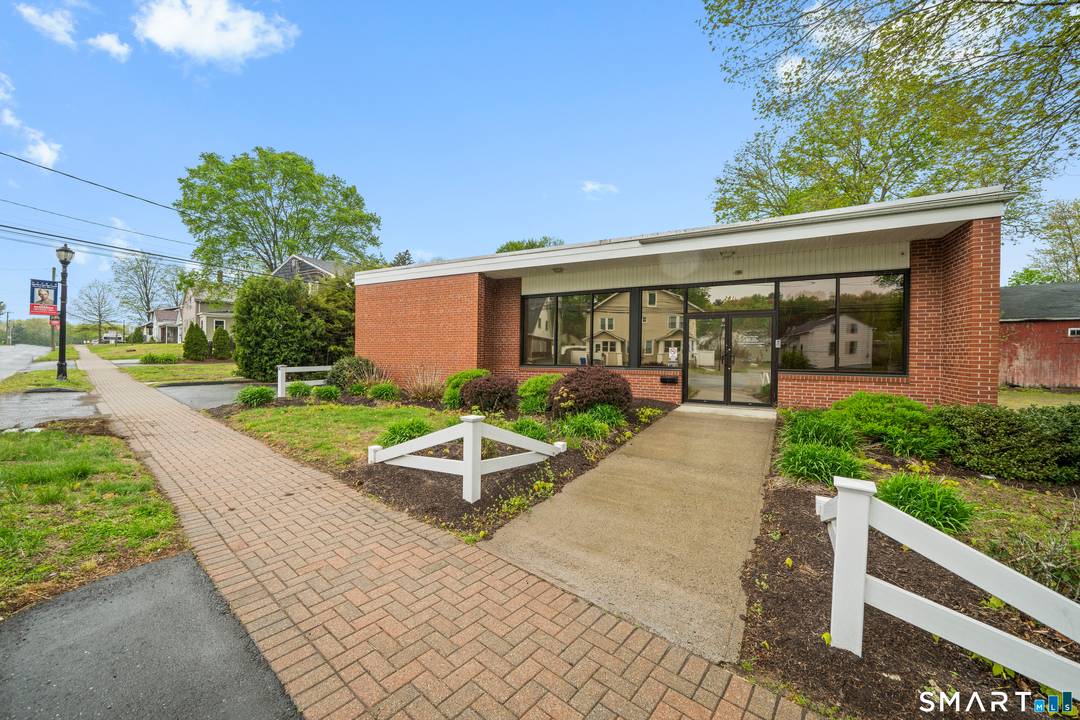 This fully renovated 3, 864 square foot brick office building, built in 1945, sits on less than half an acre.