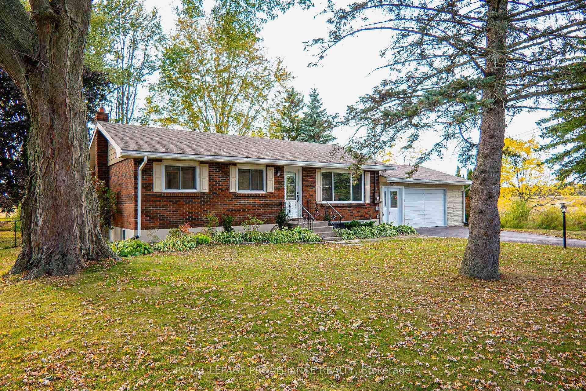 Great value in this updated, all brick bungalow on the outskirts of town, situated on a 0.
