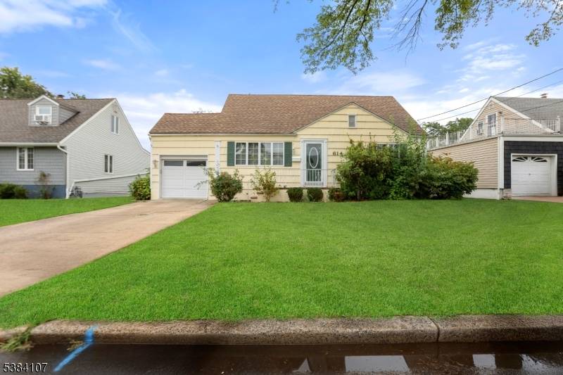 Welcome to 614 Inwood Road, a beautiful move in ready Cape Cod home in Sunnyside Linden.