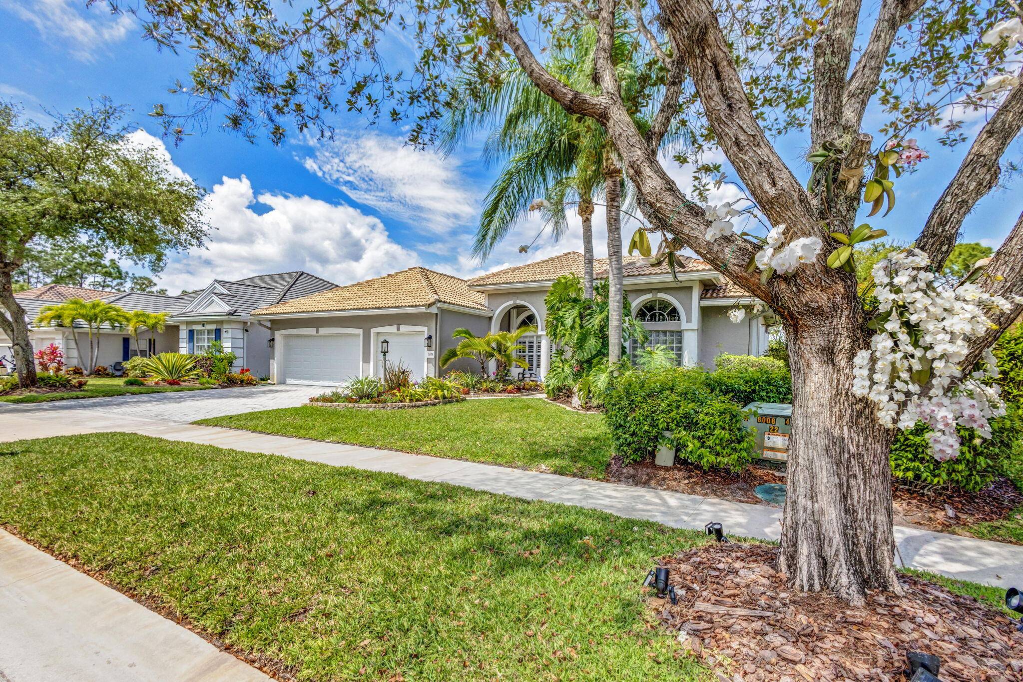 Welcome to this stunning 4 bedroom, 3 bathroom home in Stuart, Florida's gated Summerfield community.