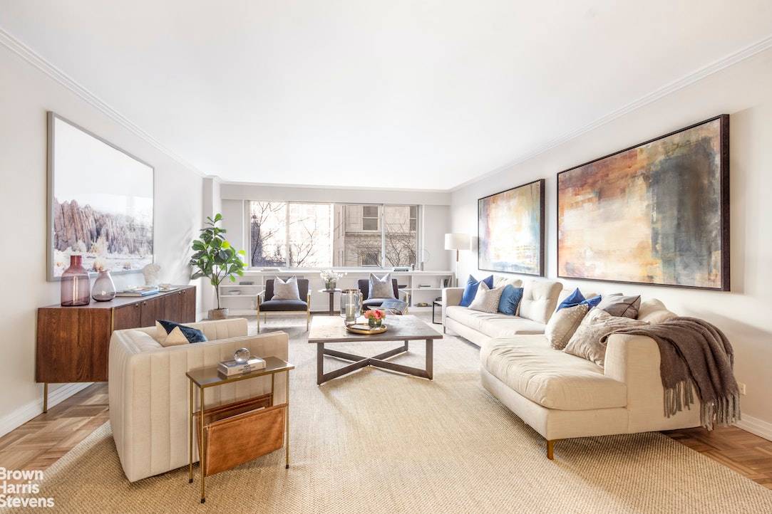 Exceptionally located on East 70th Street between Fifth Avenue and Madison and a half block from Central Park, this sun filled graciously proportioned two bed, two full bath and two ...