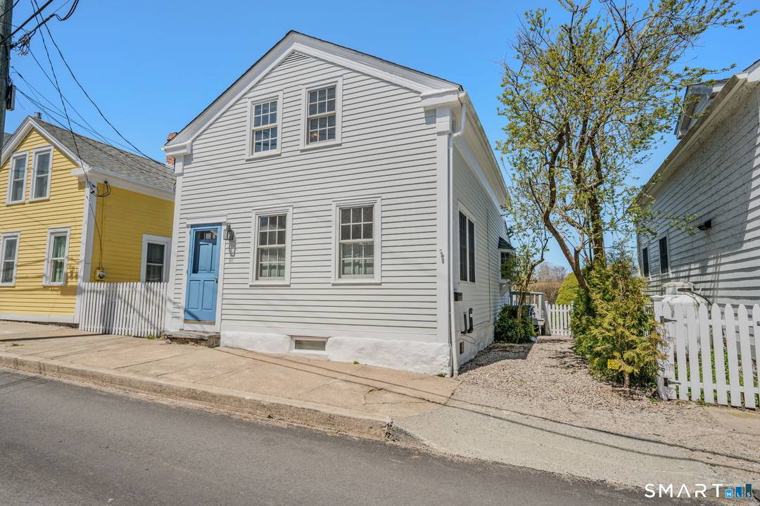 Ideally located in historic Stonington Borough with water views and a professionally landscaped backyard garden, this 3 bedroom 2 bath home offers updated kitchen and baths and the charm of ...