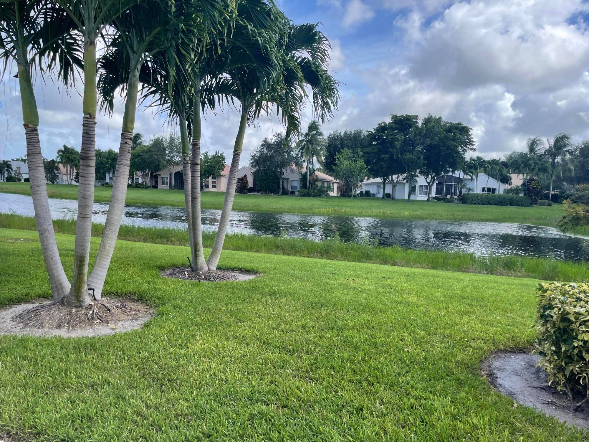STUNNING LAKEFRONT MADRID III MODEL, 4 BEDROOMS, 2 1 2 BATHS UPGRADED HOME WITH A NEW EXPANDED PATIO WITH SCREENED LANAI COMPLETED 8 25, EXTENDED GARAGE.