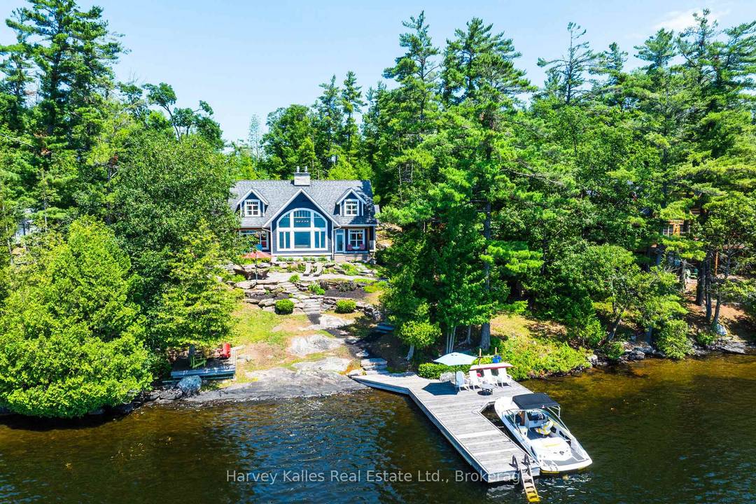 Southwest facing 5 bedroom Lake Muskoka family cottage custom built in 2010 by a well reputed Muskoka builder, and one owner cherished ever since.