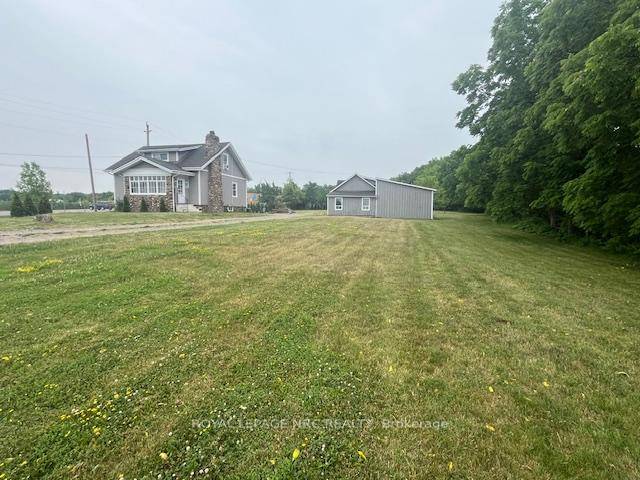 This 3 bedroom two bath home sits on a beautiful 1.