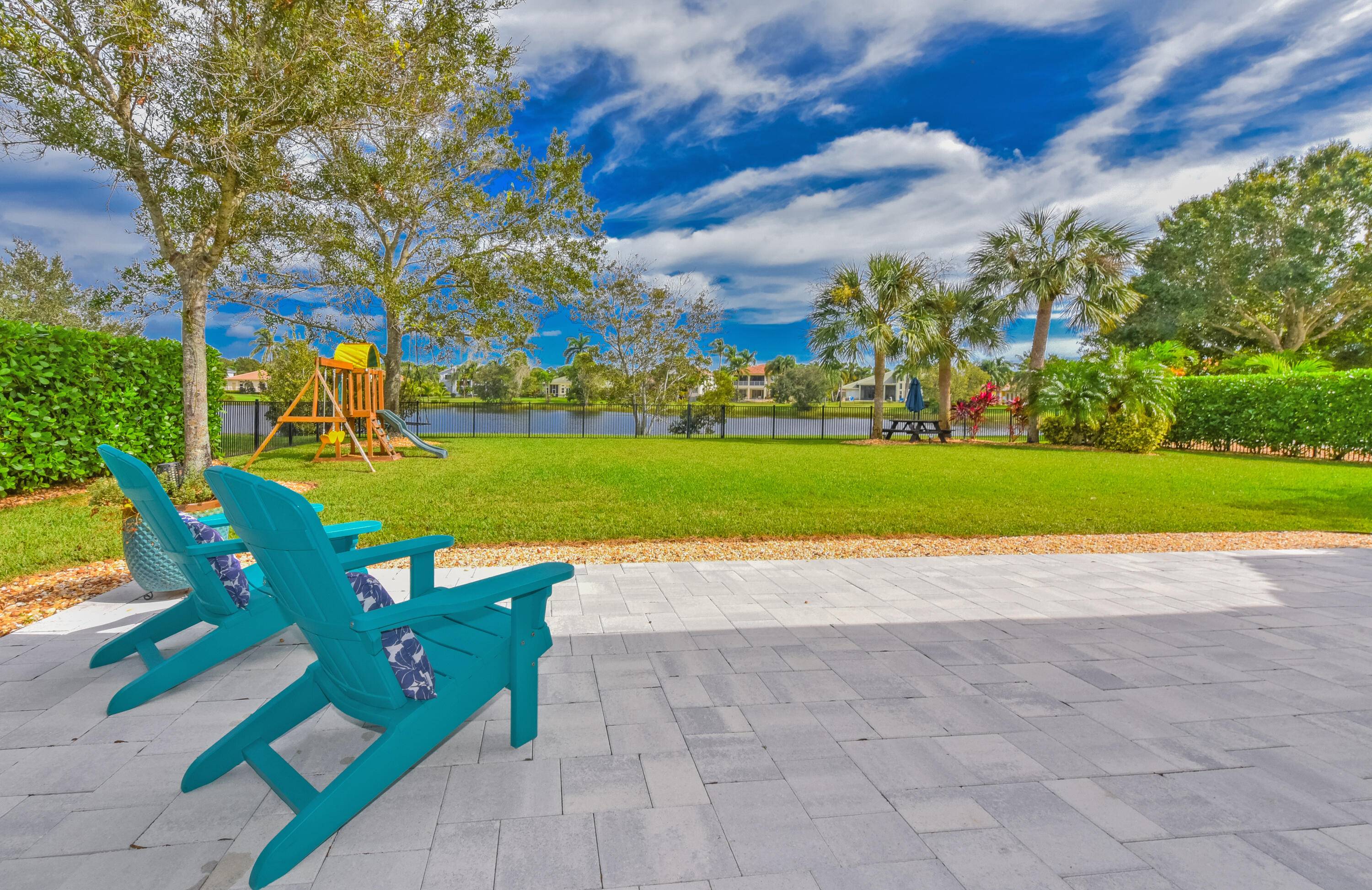 Welcome to this stunning estate home nestled within a premier gated community.