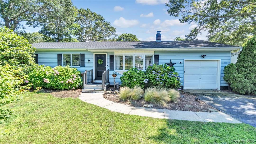 Perfectly situated on a quiet lane near the Shinnecock Canal, this impeccably updated Hamptons ranch exudes effortless sophistication and modern ease.