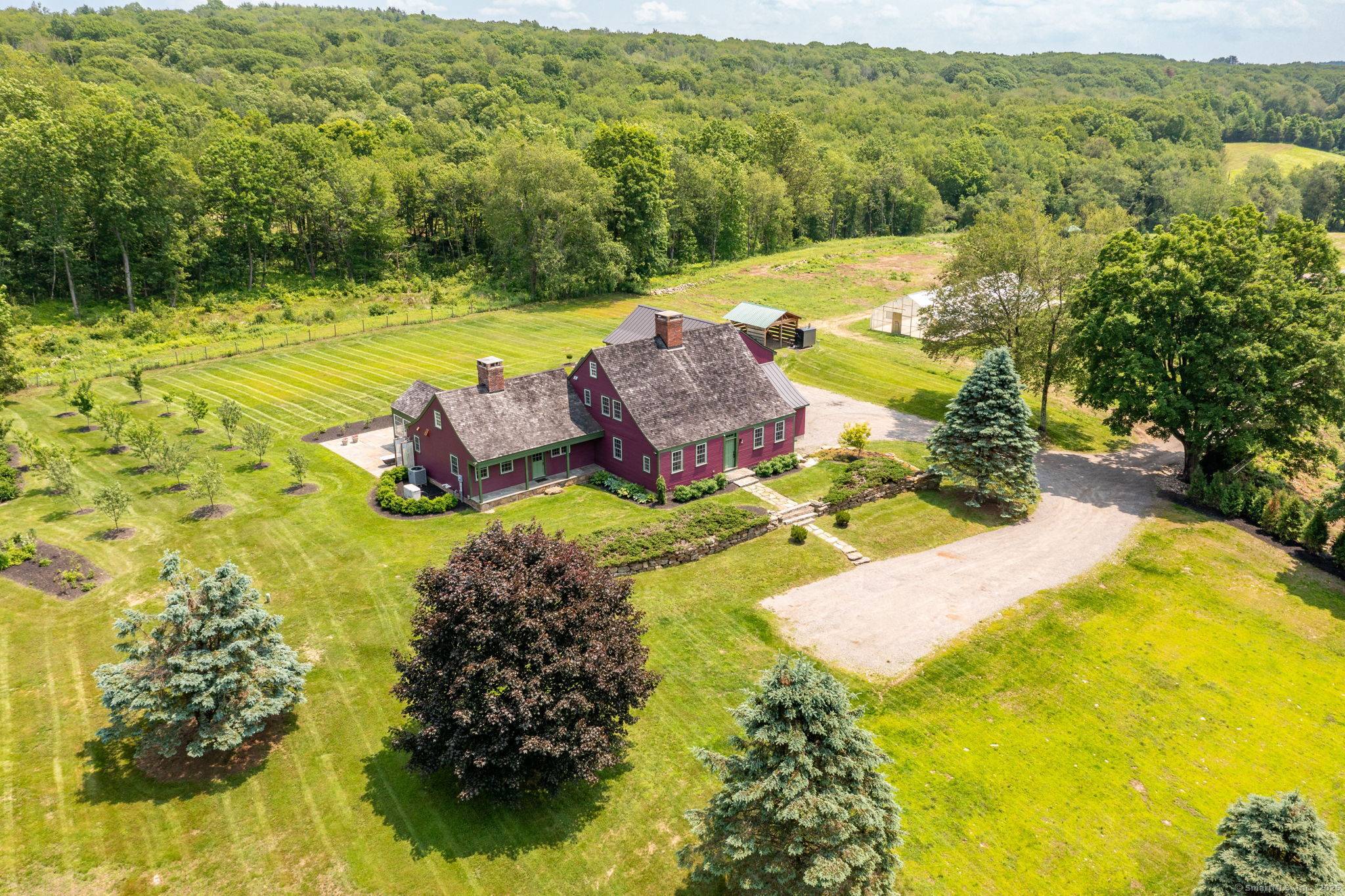 Step into a harmonious blend of history and modern luxury at Bittersweet Ranch, a meticulously updated home home dating back to 1767, set upon 39 magnificent acres backed by state ...