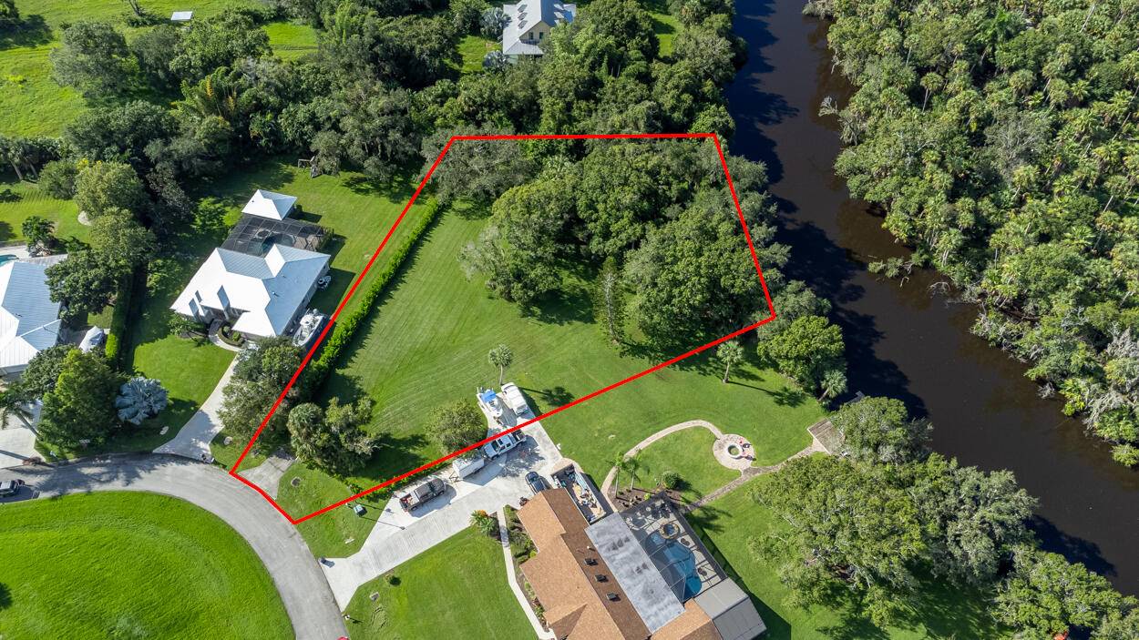 BUILD YOUR DREAM HOME ON THIS BEAUTIFUL OCEAN ACCESS WATERFRONT LOT ON THE ST LUCIE RIVER WITH APPRX 140' OF WATERFRONT.