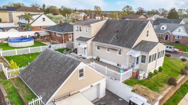 Truly unique side by side 2 family home offering exceptional space, flexibility, and value.