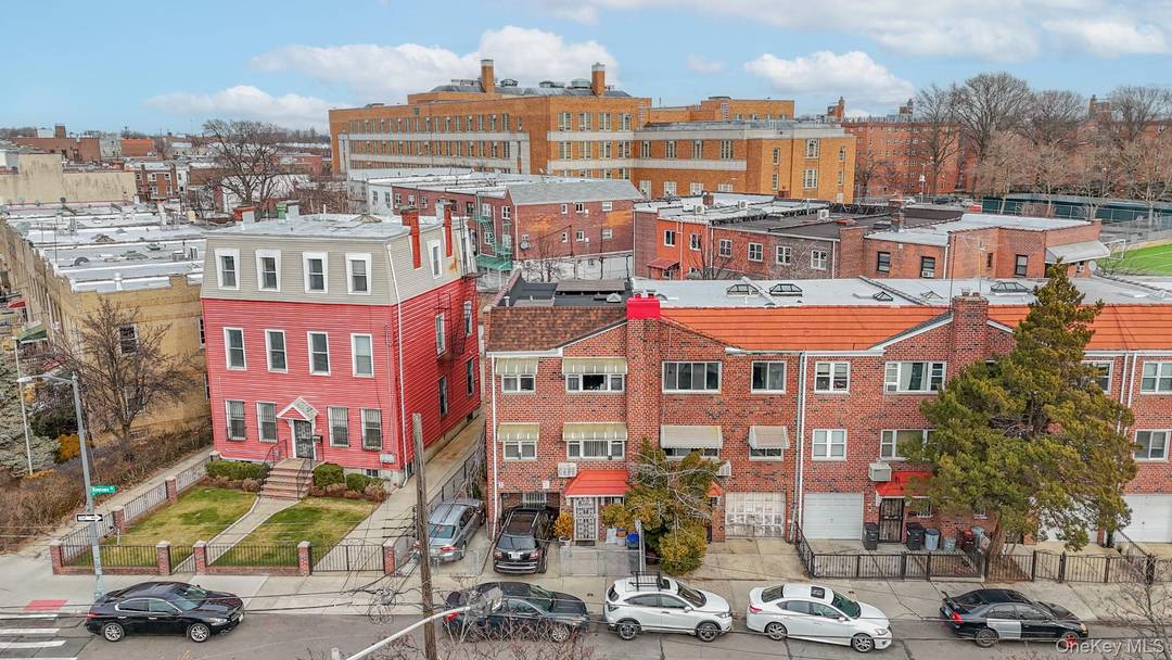 Excellent opportunity to own a 3 family Brick semi detached Row house in the heart of Long Island City !