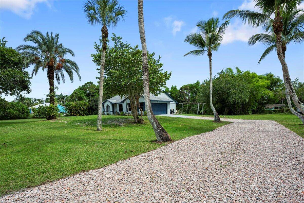 Welcome to this beautifully updated 4 bedroom, 2 bath home in the heart of Loxahatchee, offering comfort, style, and peace of mind with numerous recent upgrades.