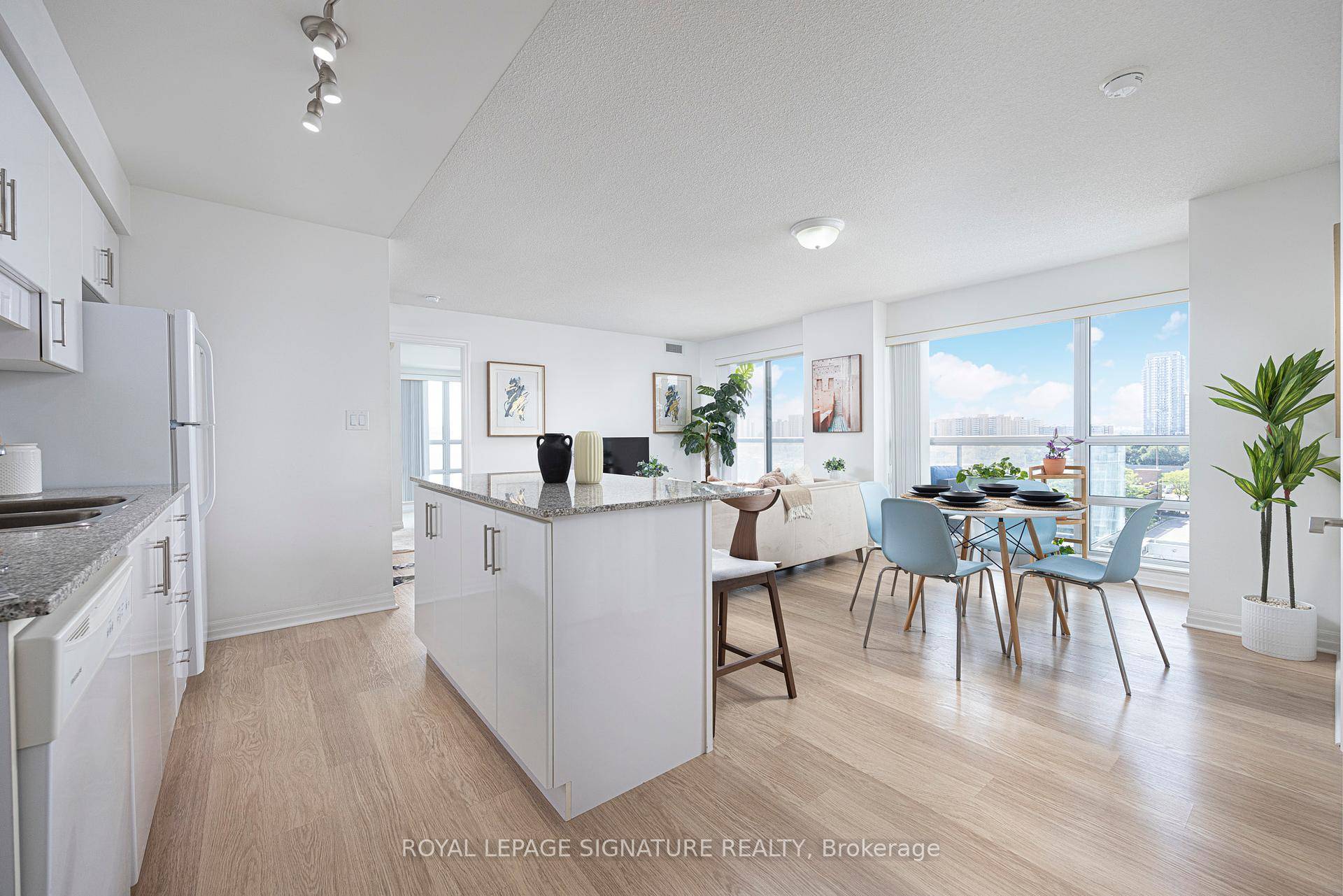 Stunning southwest facing corner unit at the sought after Legacy Condos !