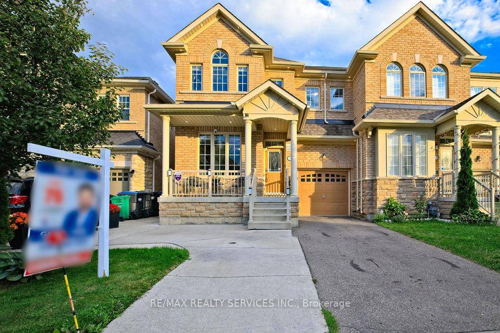 Stunning end unit freehold townhouse that feels like a semi, offering close to 3, 000 sq.