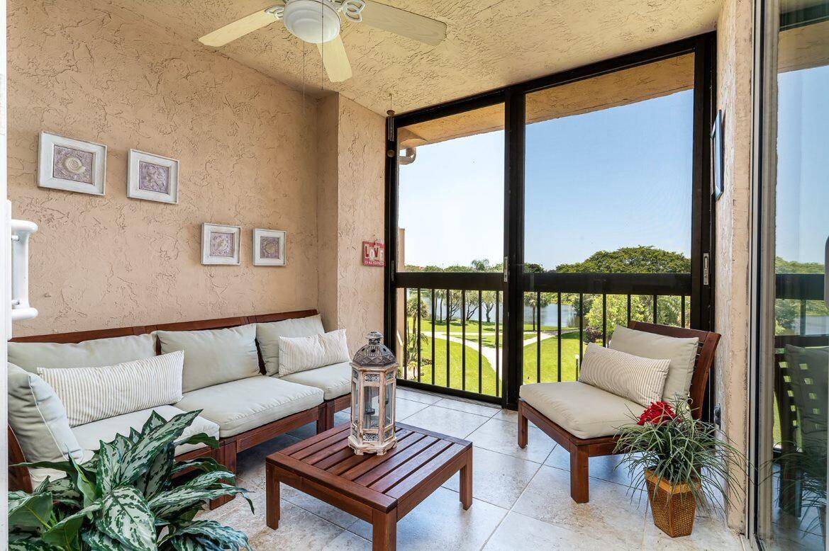 Amazing Lake and Pool views from this beautiful condo.