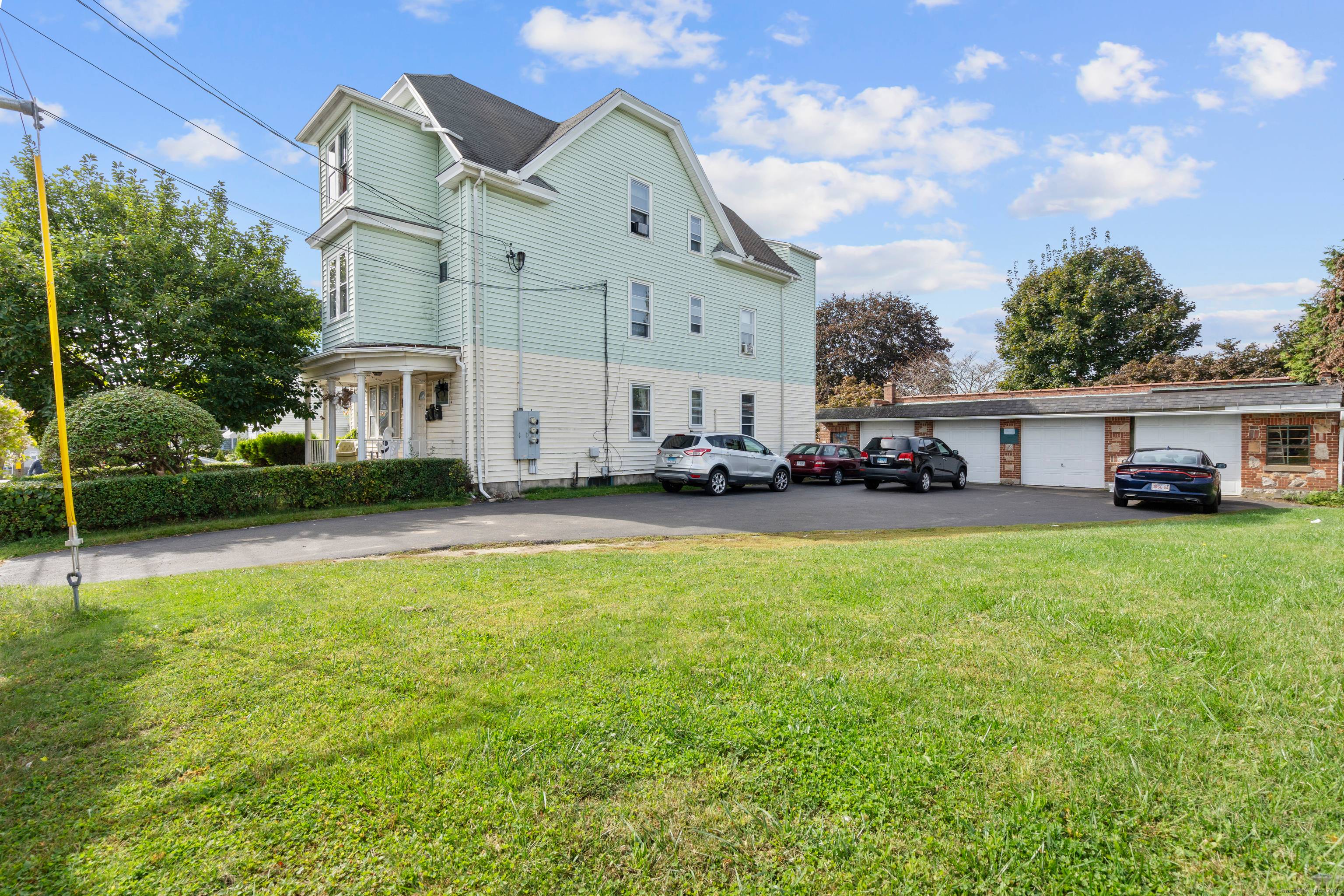 Great opportunity to own this multi family property with a 4 car detached garage !