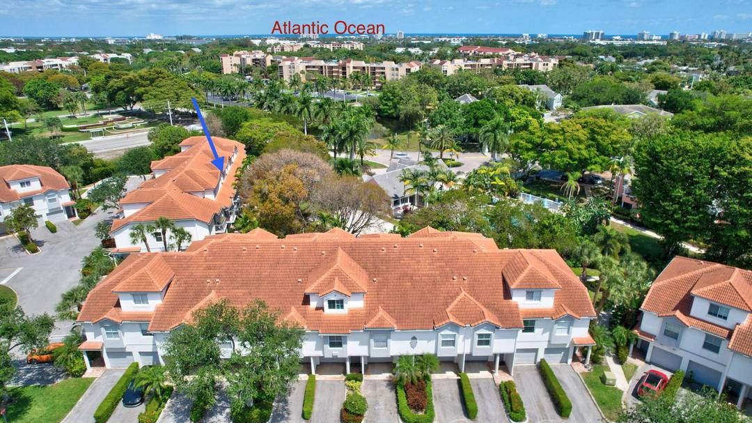 Immaculate ready to move in this three story townhouse in East Delray.