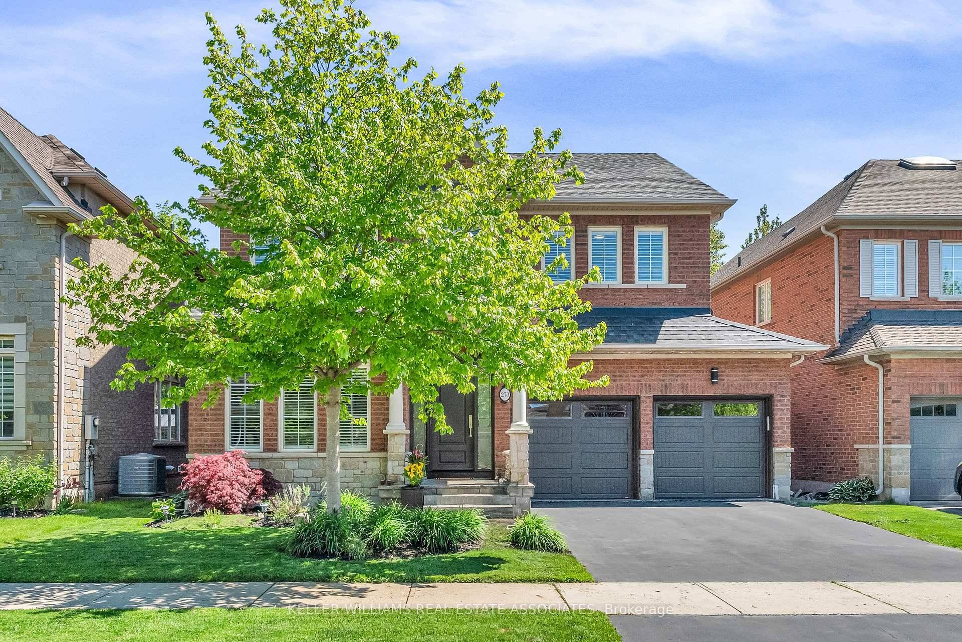 Welcome to 273 Duskywing Way, a truly exceptional executive residence nestled in the heart of Oakville's coveted Lakeshore Woods community.