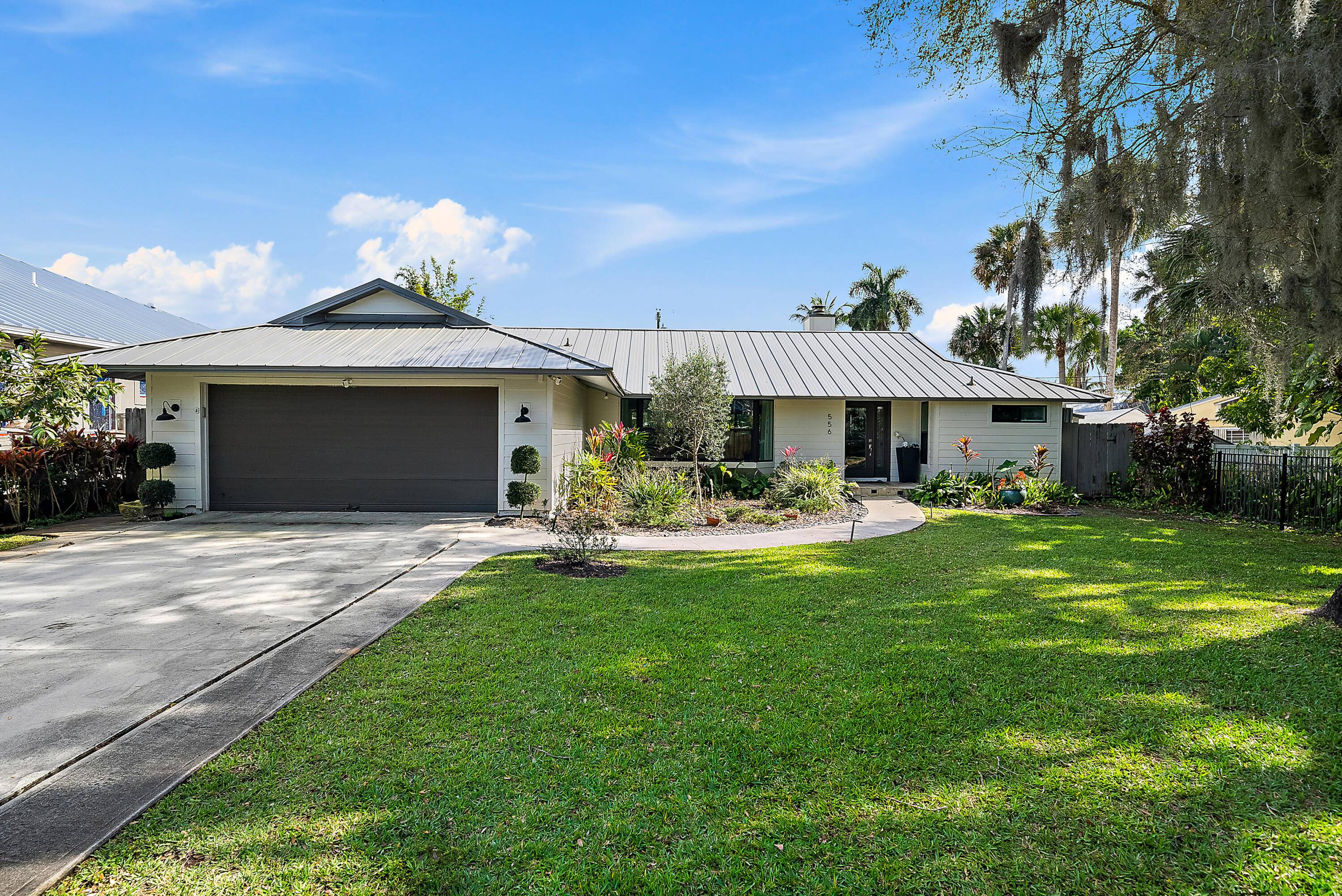Discover your dream oasis where modern luxury meets rustic charm in this boating friendly community !