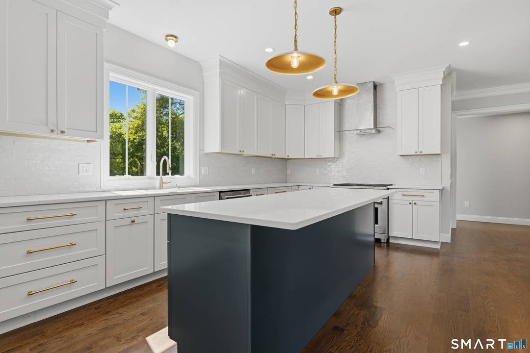 Welcome to 360 Taulman Road, where timeless architecture and modern luxury come together in one of Orange's most desirable locations.